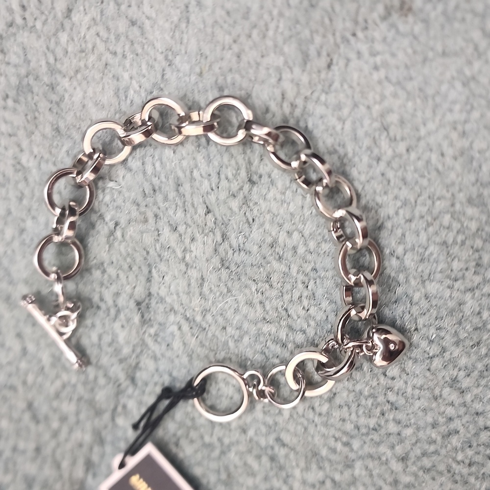 Vintage Juicy Couture Silver bracelet with rhinestone on heart